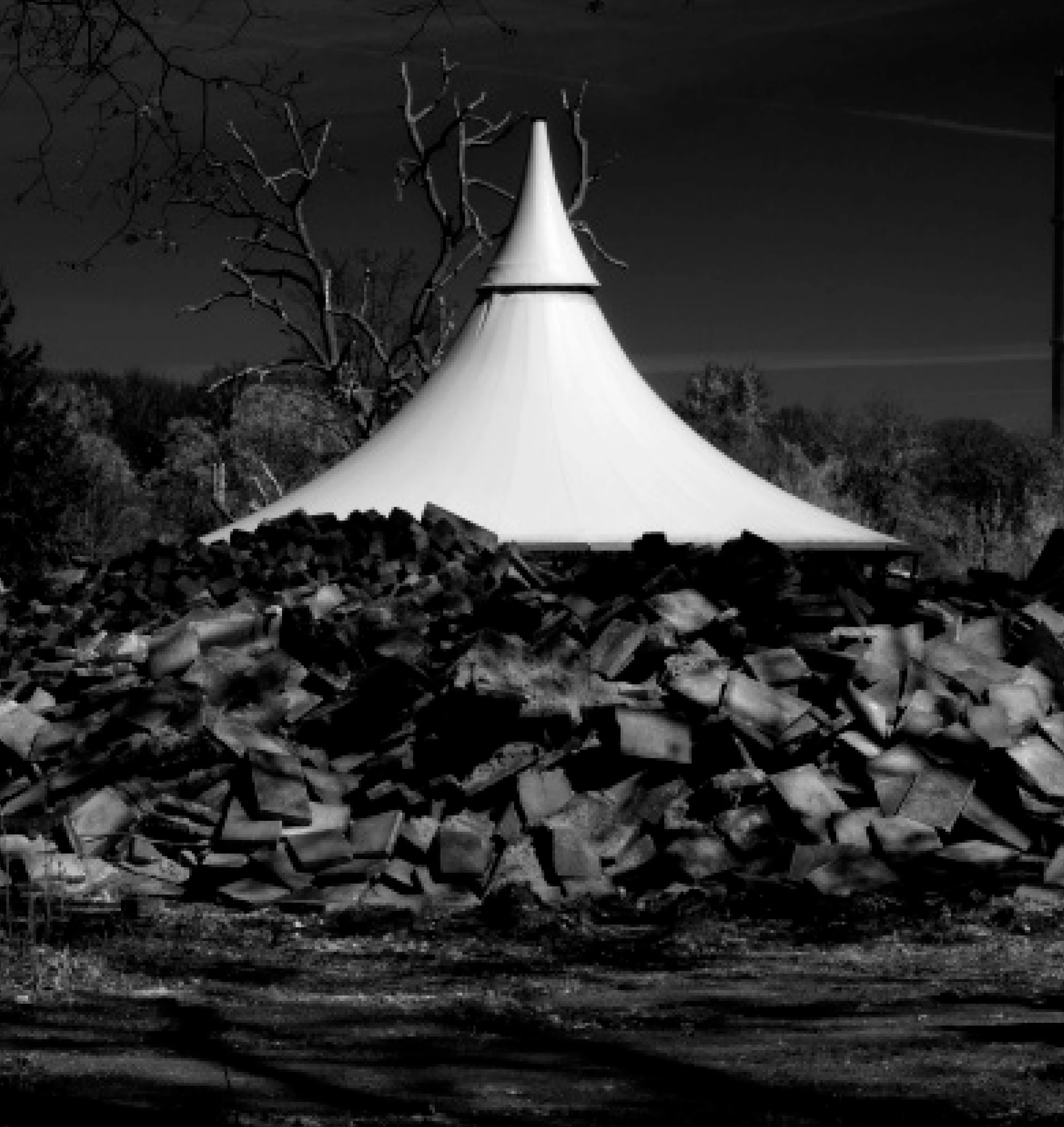 White pointed canopy among rubble at Spreepark