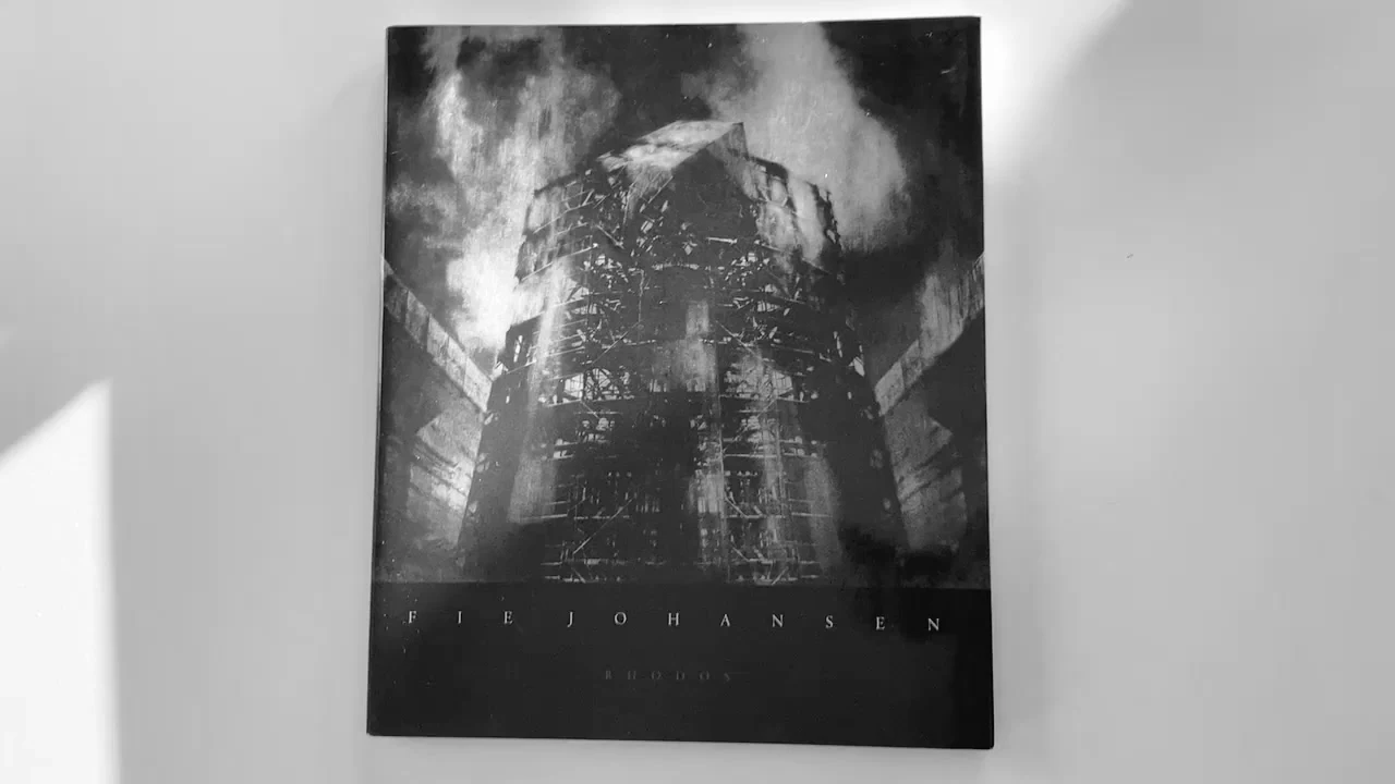 Photography book shown in the book film