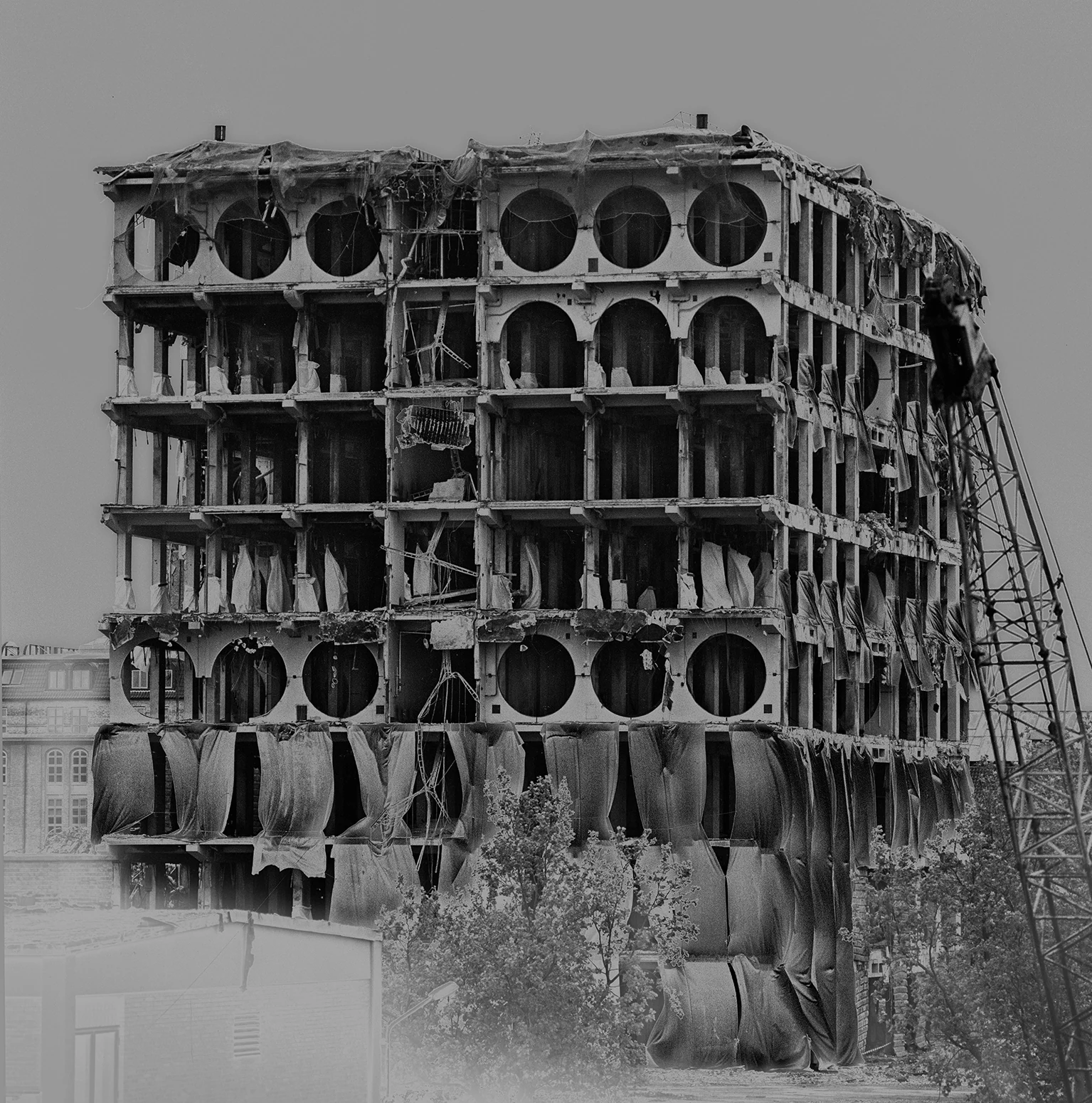 Building facade with repeating round openings